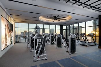 24-Hour fitness center with motivational wall